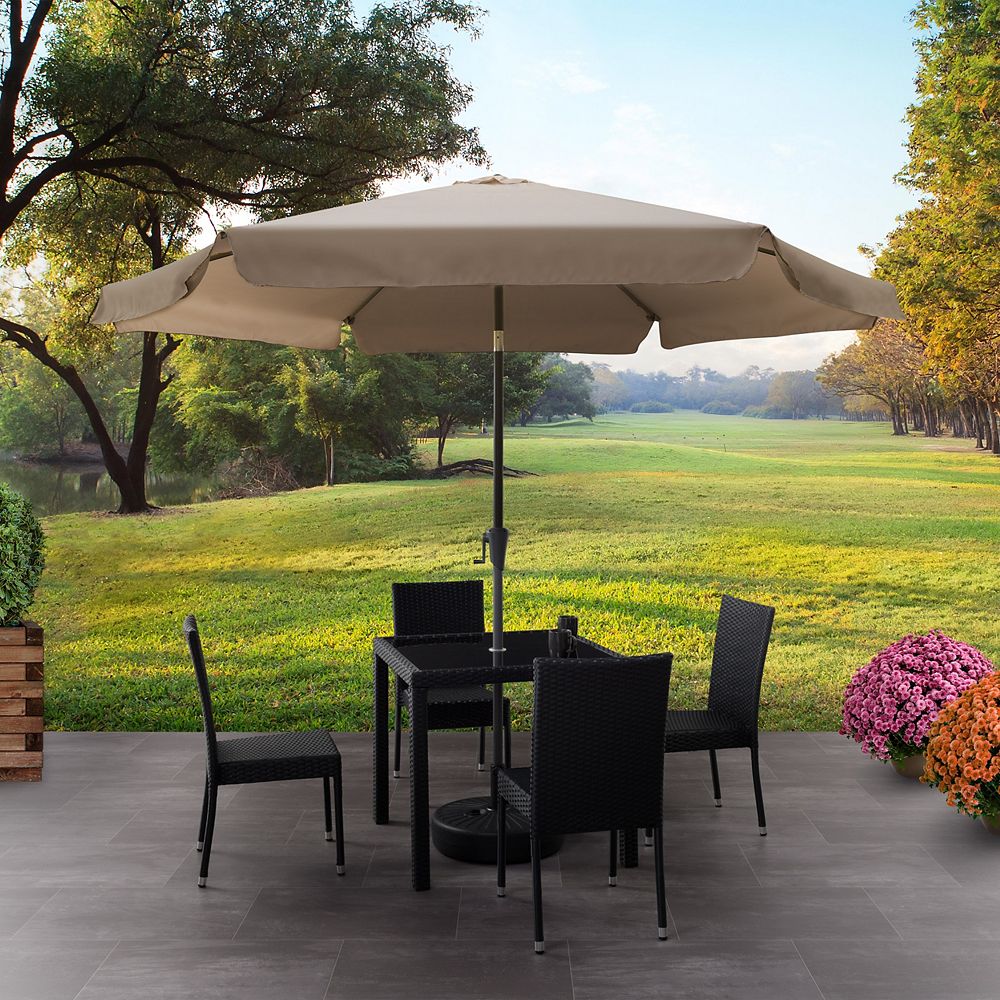 brown patio set with umbrella